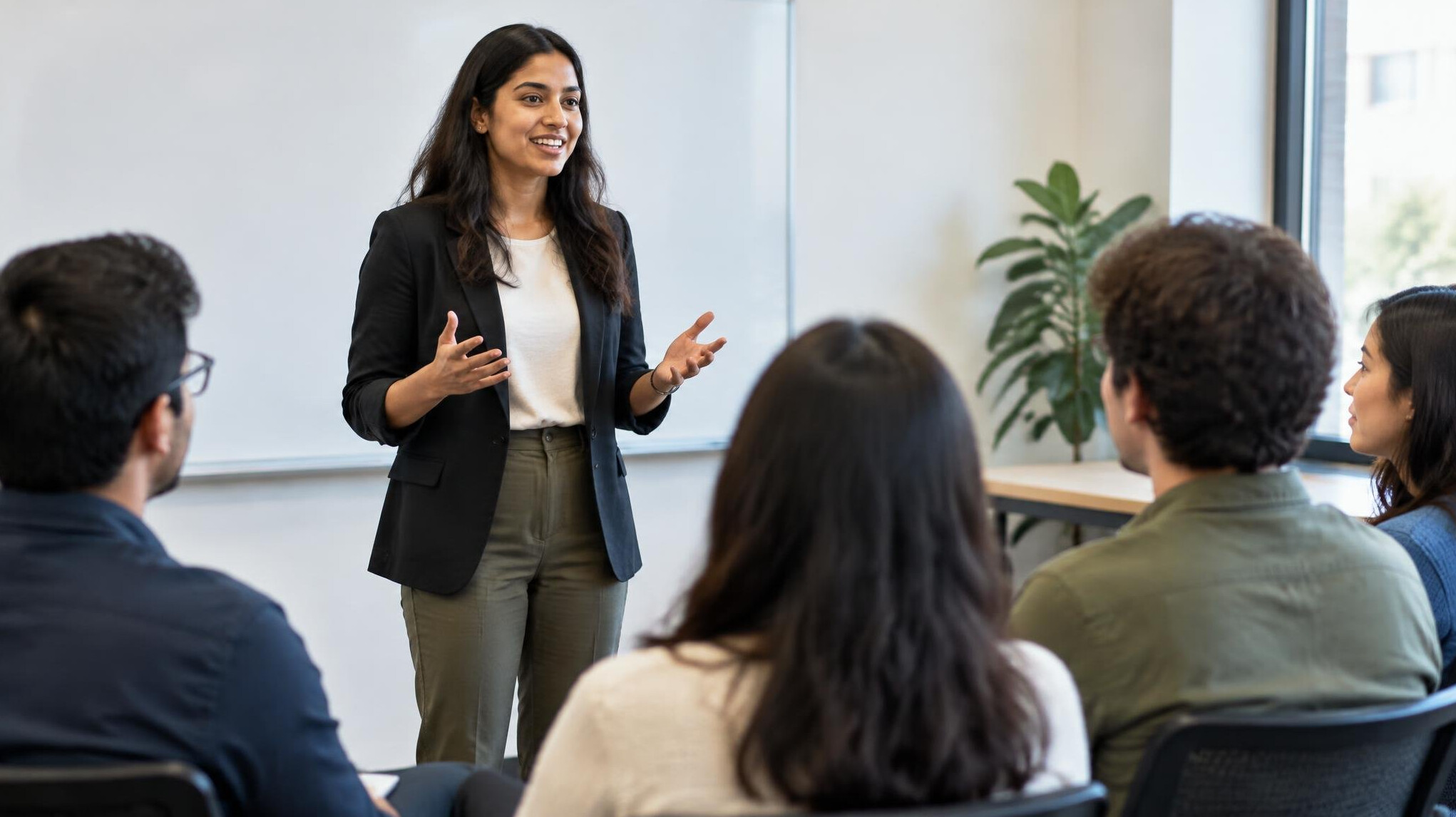 person speaking in front of group