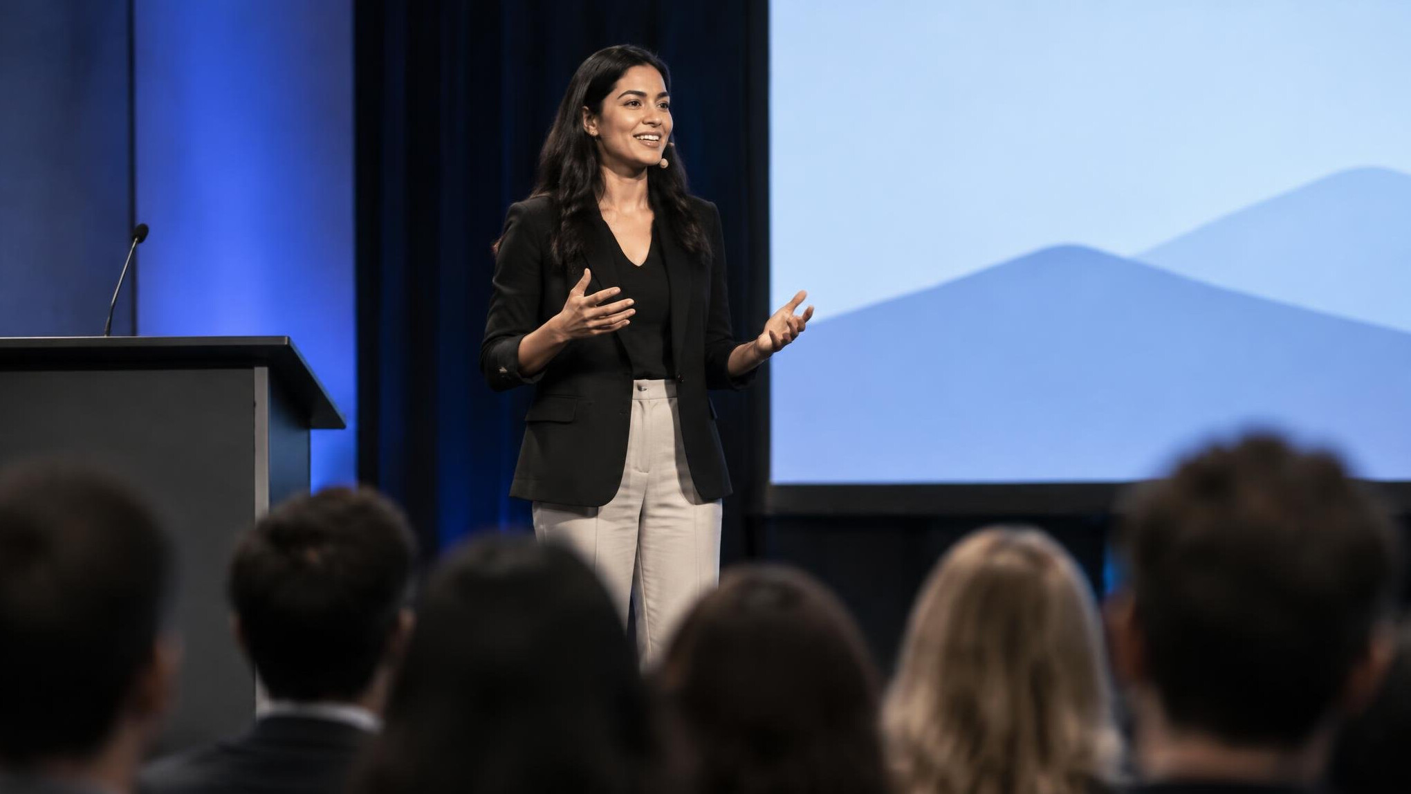 confident speaker on stage
